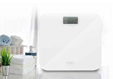 white towels on white table with copy space on bright room background. For product display montage.